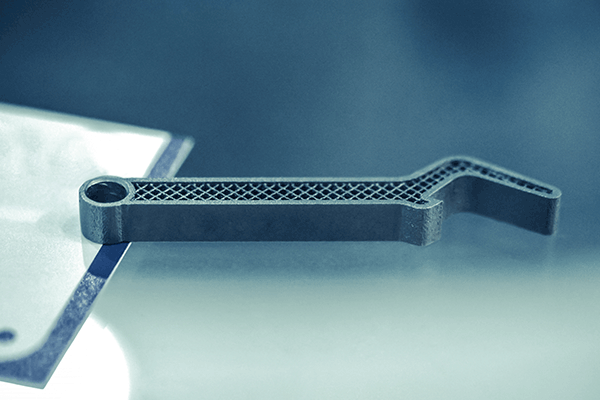 The finished prototype of a machine component.